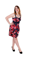 Pretty woman standing in colorful dress