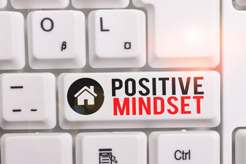 Word writing text Positive Mindset. Business photo showcasing mental attitude in wich you expect favorable results White pc keyboard with empty note paper above white background key copy space