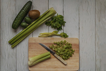 The process of making a vitamin smoothie from fruits and vegetables. Proper and wholesome nutrition. Diet.