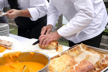 professiona lcook preparing food outdoor