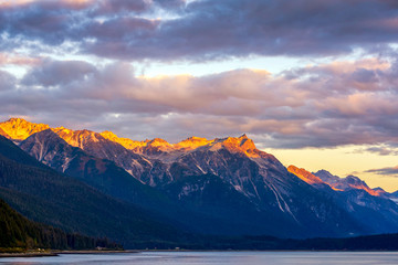 Alpen Glow in the Mountains by Ocean and Coastline 