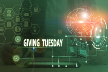 Conceptual hand writing showing Giving Tuesday. Concept meaning international day of charitable giving Hashtag activism Picture photo network scheme with modern smart device