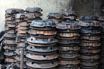 Rusty old car parts pile