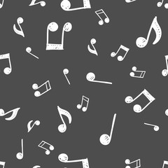 Musical notes doodles seamless pattern. Music symbols texture.