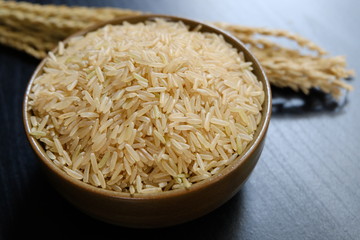 Parboiled brown rice in bowl.