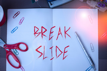 Text sign showing Break Slide. Business photo text a good cover slide for each section of the presentation Scissors and writing equipments plus math book above textured backdrop
