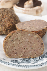 Traditional English faggots nicknamed savoury ducks made with ground pork and offcuts