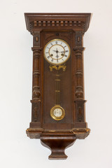 vintage wooden clock on the wall