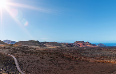 colorful volcanic landscape at Timanfaya National Park, montanas del fuego, on Lanzarote, Canary...
