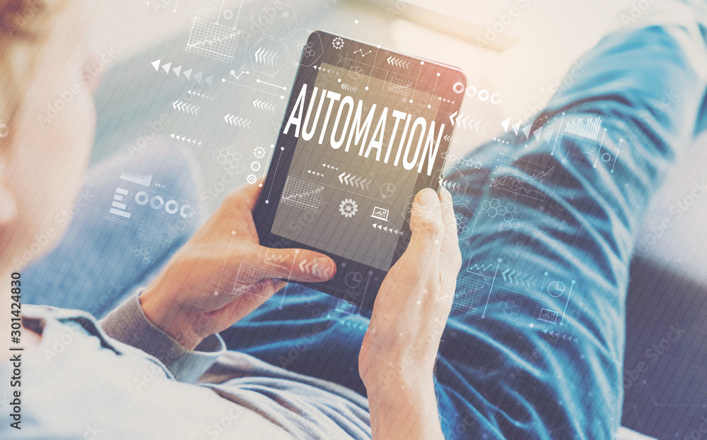 Poster automation with man using a tablet in a chair