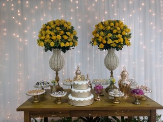 flowers in a vase and cake