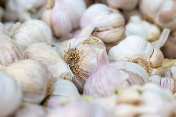 small market. sales of garlic. close-up, and shallow depth of field