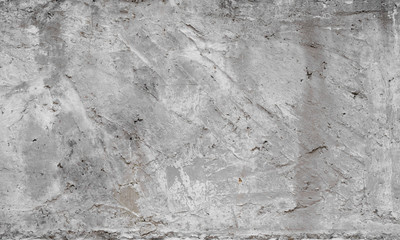Texture of old concrete wall for background. White concrete wall background with a cracks nad holes.