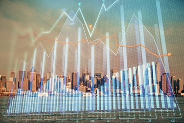 Forex chart on cityscape with skyscrapers wallpaper double exposure. Financial research concept.