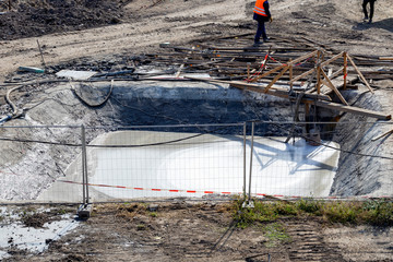 Temporary concrete washout at construction site