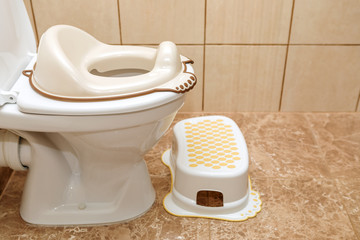 Lid for toilet seat for children. How to accustom a child to the toilet.