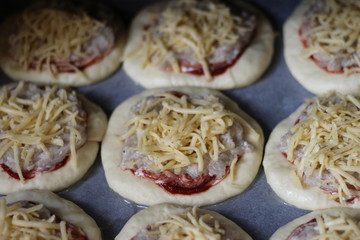 raw homemade pizza with meat