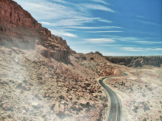 Beautiful road across the mountains of National Park, aerial view from drone