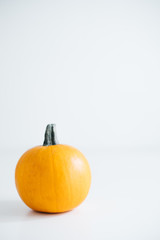 Fresh pumpkin isolated on white background. For Halloween, thanksgiving holiday and Autumn theme