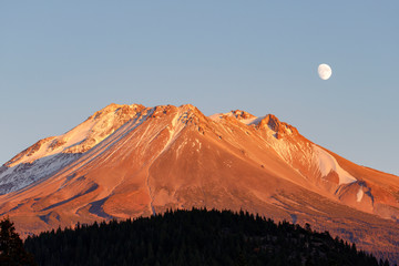 Moon Rising Over Mt. Shasta in northern California at Sunset