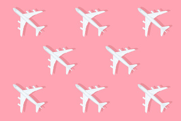plane on pastel pink background , travel or vacation pattern . 3d illustration . 