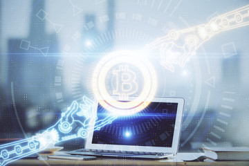 Multi exposure of blockchain theme hologram and table with computer background. Concept of bitcoin crypto currency.