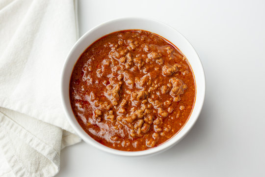 Top View Of A Bowl Of Red Chili. Copy Space. 