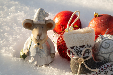 Christmas decorations, Christmas tree toys on the background of white, just fallen snow.