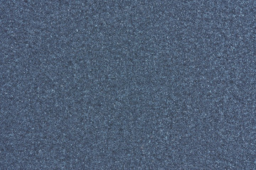 Fototapeta premium Blue paper with abstract texture for background. Paper for interior and exterior decoration or background for handcrafts. Blue paper background.