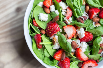 Strawberry salad with spinach, almonds and feta cheese. 