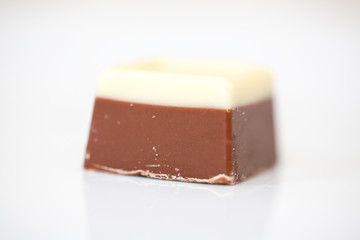 Yummy chocolate candies on white background - Image