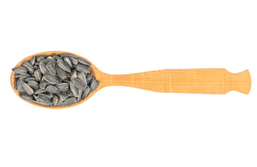 Sunflower seeds in a spoon
