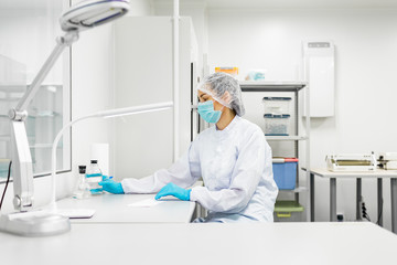 Naklejka premium Laboratory for the production of biomaterials. People do research.