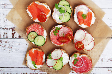 Top view on different sandwiches, flat lay	