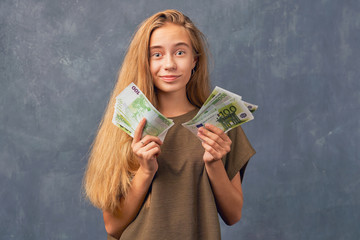 Teenage girl blonde isolated texture wall Studio