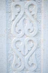 The Kazakh national ornament is carved in stone.