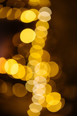 New Year 2020 interior with candles, bulbs and bokeh