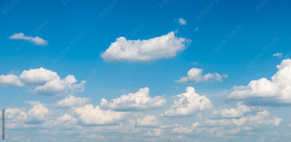 Wall mural blue sky and clouds background