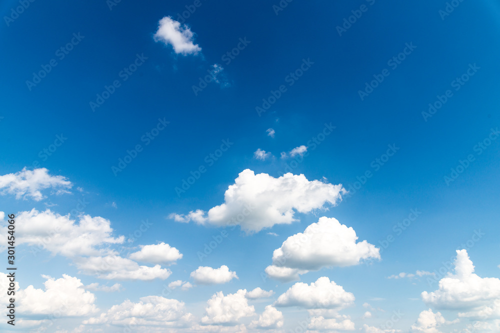 Wall mural blue sky and clouds background