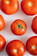 Tomatoes isolated on a white background.