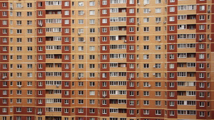 Wall of a modern multi-storey apartment building, texture for the background