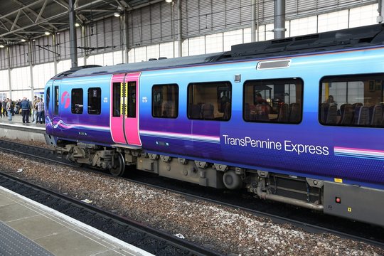 LEEDS, UK - JULY 12, 2016: TransPennine Express train of First Group at Leeds Station in the UK. Leeds railway station was used by 28.8 million annual passengers in 2014/15.