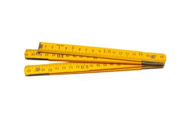 Yellow, wooden, construction ruler isolated on a white background.