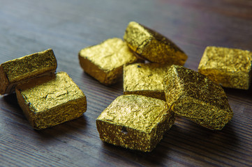 Chinese tea in gold packaging on a wooden table2