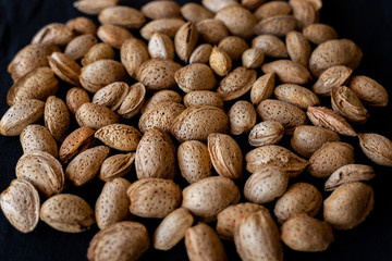 Almonds on a black background