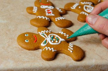 gingerbread man painting on the kitchen table