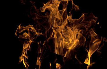 Closeup image of bonfire on black background