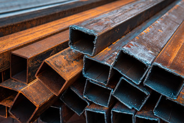 Steel bar for construction.Metal pipe profile. Stock photo of metal beams.