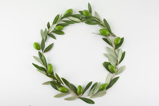 Green Olive Wreath On White Background. Top View