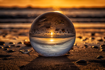sunset in crystal ball - Powered by Adobe